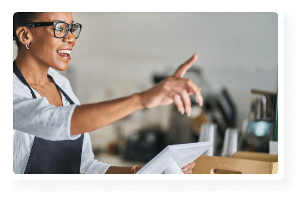  A girl with smiley face using pos billing software for managing her orders easily.